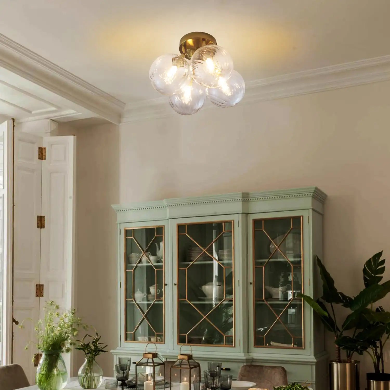Modern Brass Four-Light Semi Flush Mount Ceiling Light with Clear Ribbed Glass Globe Bubbles