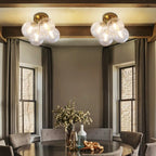 Modern Brass Four-Light Semi Flush Mount Ceiling Light with Clear Ribbed Glass Globe Bubbles