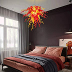 Sun Flare Hand Blown Glass Art Chandelier Red and Amber Artisan Coils Sculptural Pendant Light for Modern Interiors