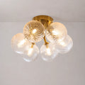 Modern Brass Six-Light Semi Flush Mount Ceiling Light with Clear Ribbed Glass Globe Bubbles
