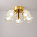 Modern Brass Five-Light Semi Flush Mount Ceiling Light with Clear Ribbed Glass Globe Bubbles